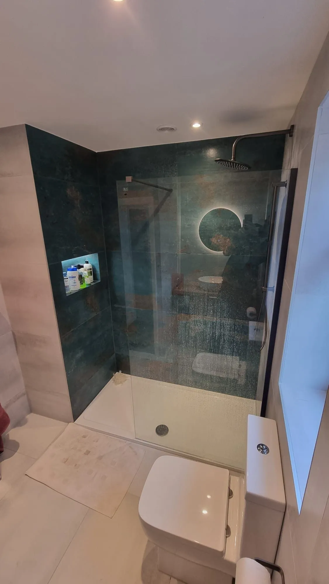 smart bathroom with new shower door
